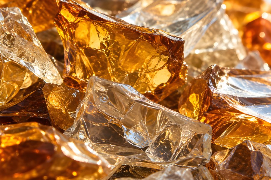 Close-Up Pile of Amber and Clear Glass Cullet, Colour-Sorted for Glass Recycling